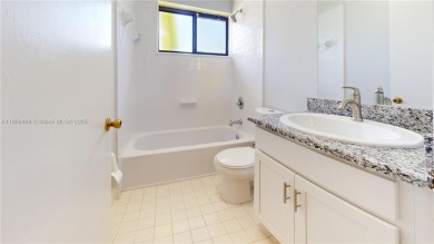 Discover your dream home in this beautifully designed residence on Palmetto Golf Course in Florida - for sale on GolfHomes.com, golf home, golf lot