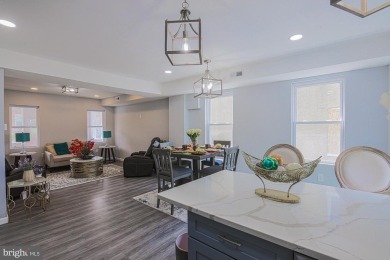 This charming end-of-row townhouse, built in 1924, seamlessly on Clifton Park Golf Course in Maryland - for sale on GolfHomes.com, golf home, golf lot