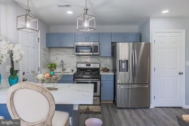 This charming end-of-row townhouse, built in 1924, seamlessly on Clifton Park Golf Course in Maryland - for sale on GolfHomes.com, golf home, golf lot