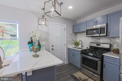 This charming end-of-row townhouse, built in 1924, seamlessly on Clifton Park Golf Course in Maryland - for sale on GolfHomes.com, golf home, golf lot