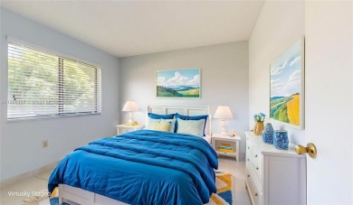 Discover your dream home in this beautifully designed residence on Palmetto Golf Course in Florida - for sale on GolfHomes.com, golf home, golf lot