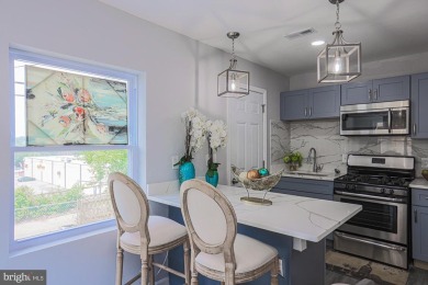 This charming end-of-row townhouse, built in 1924, seamlessly on Clifton Park Golf Course in Maryland - for sale on GolfHomes.com, golf home, golf lot