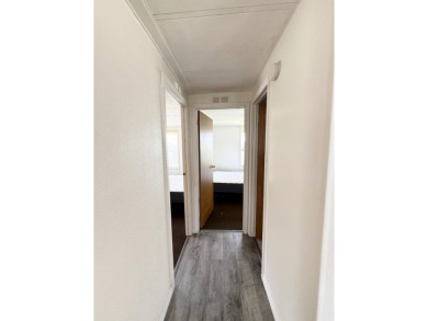 PRICED TO SELL!!! This 2-bedroom, 2 full bath home needs someone on Grasslands Golf and Country Club in Florida - for sale on GolfHomes.com, golf home, golf lot