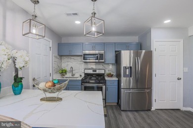 This charming end-of-row townhouse, built in 1924, seamlessly on Clifton Park Golf Course in Maryland - for sale on GolfHomes.com, golf home, golf lot