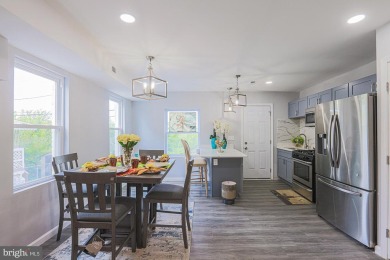 This charming end-of-row townhouse, built in 1924, seamlessly on Clifton Park Golf Course in Maryland - for sale on GolfHomes.com, golf home, golf lot