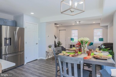 This charming end-of-row townhouse, built in 1924, seamlessly on Clifton Park Golf Course in Maryland - for sale on GolfHomes.com, golf home, golf lot
