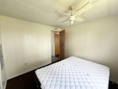 PRICED TO SELL!!! This 2-bedroom, 2 full bath home needs someone on Grasslands Golf and Country Club in Florida - for sale on GolfHomes.com, golf home, golf lot