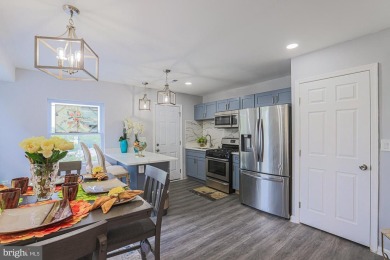 This charming end-of-row townhouse, built in 1924, seamlessly on Clifton Park Golf Course in Maryland - for sale on GolfHomes.com, golf home, golf lot
