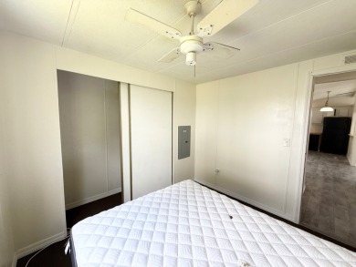 PRICED TO SELL!!! This 2-bedroom, 2 full bath home needs someone on Grasslands Golf and Country Club in Florida - for sale on GolfHomes.com, golf home, golf lot