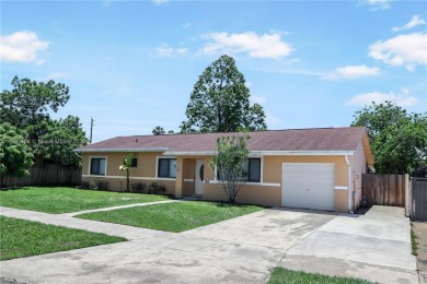 Discover your dream home in this beautifully designed residence on Palmetto Golf Course in Florida - for sale on GolfHomes.com, golf home, golf lot