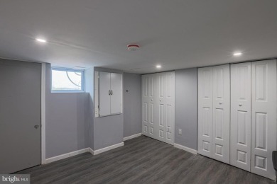 This charming end-of-row townhouse, built in 1924, seamlessly on Clifton Park Golf Course in Maryland - for sale on GolfHomes.com, golf home, golf lot