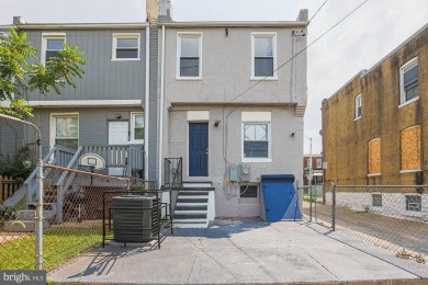 This charming end-of-row townhouse, built in 1924, seamlessly on Clifton Park Golf Course in Maryland - for sale on GolfHomes.com, golf home, golf lot