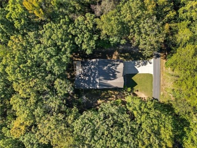 Welcome home to a beautifully updated retreat that truly checks on The Highlands Course at Lake Arrowhead in Georgia - for sale on GolfHomes.com, golf home, golf lot