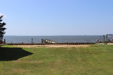 3/1319 Direct Bay Front lot with approximately 65' of vinyl on Captains Cove Golf and Yacht Club in Virginia - for sale on GolfHomes.com, golf home, golf lot