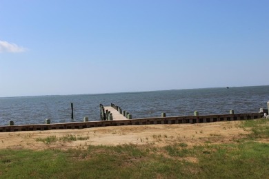 3/1319 Direct Bay Front lot with approximately 65' of vinyl on Captains Cove Golf and Yacht Club in Virginia - for sale on GolfHomes.com, golf home, golf lot