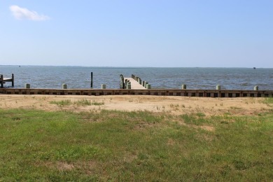 3/1319 Direct Bay Front lot with approximately 65' of vinyl on Captains Cove Golf and Yacht Club in Virginia - for sale on GolfHomes.com, golf home, golf lot