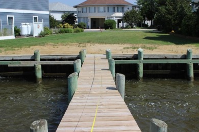 3/1319 Direct Bay Front lot with approximately 65' of vinyl on Captains Cove Golf and Yacht Club in Virginia - for sale on GolfHomes.com, golf home, golf lot