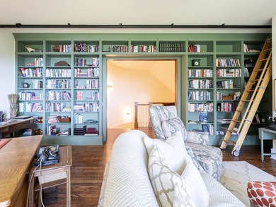 Craftsman-style Iron Horse residence perched above the 14th hole on Iron Horse Golf Club in Montana - for sale on GolfHomes.com, golf home, golf lot