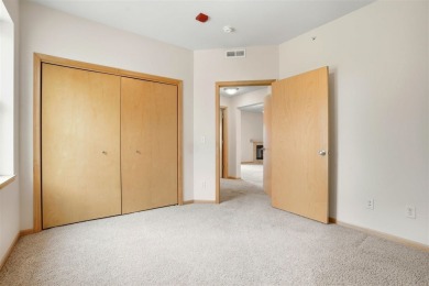 First-Floor Condo Near Blue Top Ridge Golf Course  Welcome to on Blue Top Ridge At Riverside in Iowa - for sale on GolfHomes.com, golf home, golf lot