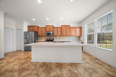 Welcome to this well-maintained 3 bedroom, 2 bath home nestled on Candler Hills Golf and Country Club in Florida - for sale on GolfHomes.com, golf home, golf lot