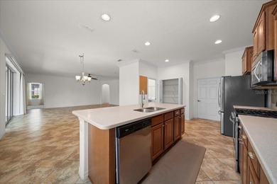 Welcome to this well-maintained 3 bedroom, 2 bath home nestled on Candler Hills Golf and Country Club in Florida - for sale on GolfHomes.com, golf home, golf lot