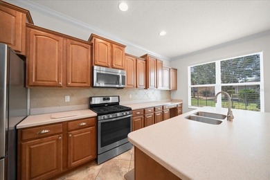 Welcome to this well-maintained 3 bedroom, 2 bath home nestled on Candler Hills Golf and Country Club in Florida - for sale on GolfHomes.com, golf home, golf lot