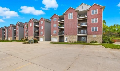 First-Floor Condo Near Blue Top Ridge Golf Course  Welcome to on Blue Top Ridge At Riverside in Iowa - for sale on GolfHomes.com, golf home, golf lot