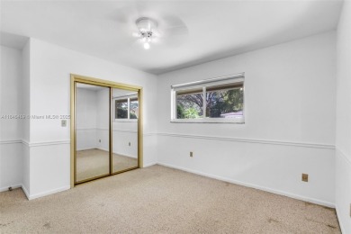 Welcome to the upscale golf-course community of Loch Lomond, one on Don Shulas Golf Course and Club in Florida - for sale on GolfHomes.com, golf home, golf lot