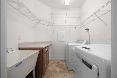 Welcome to this well-maintained 3 bedroom, 2 bath home nestled on Candler Hills Golf and Country Club in Florida - for sale on GolfHomes.com, golf home, golf lot