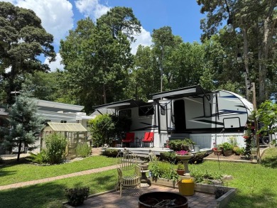 Nice corner lot with septic.  2022 one bedroom camper in on Captains Cove Golf and Yacht Club in Virginia - for sale on GolfHomes.com, golf home, golf lot