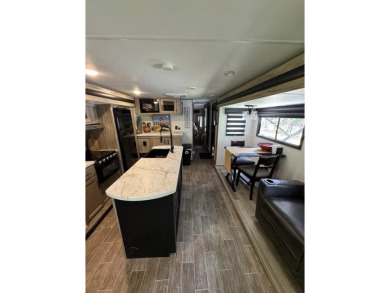 Nice corner lot with septic.  2022 one bedroom camper in on Captains Cove Golf and Yacht Club in Virginia - for sale on GolfHomes.com, golf home, golf lot