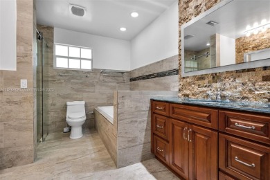 Welcome to the upscale golf-course community of Loch Lomond, one on Don Shulas Golf Course and Club in Florida - for sale on GolfHomes.com, golf home, golf lot