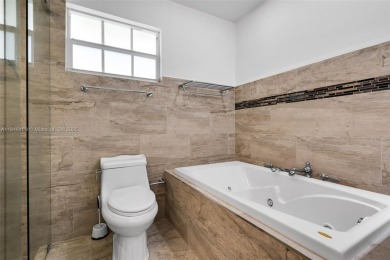 Welcome to the upscale golf-course community of Loch Lomond, one on Don Shulas Golf Course and Club in Florida - for sale on GolfHomes.com, golf home, golf lot