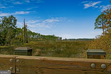 Come see this incredible home with stunning views of the marshes on The Club At Osprey Cove in Georgia - for sale on GolfHomes.com, golf home, golf lot