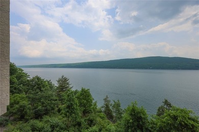 Enjoy the sunrises on the spacious balcony with million dollar on Bristol Harbour Golf Club in New York - for sale on GolfHomes.com, golf home, golf lot