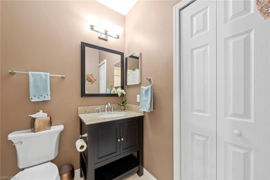 Experience resort-style living in this stunning 2-bedroom on Estero Country Club in Florida - for sale on GolfHomes.com, golf home, golf lot