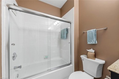 Experience resort-style living in this stunning 2-bedroom on Estero Country Club in Florida - for sale on GolfHomes.com, golf home, golf lot