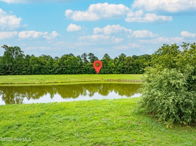 Imagine waking up each morning to peaceful water views and the on River Landing Golf Course in North Carolina - for sale on GolfHomes.com, golf home, golf lot