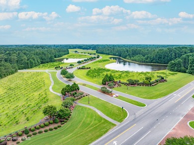 Imagine waking up each morning to peaceful water views and the on River Landing Golf Course in North Carolina - for sale on GolfHomes.com, golf home, golf lot