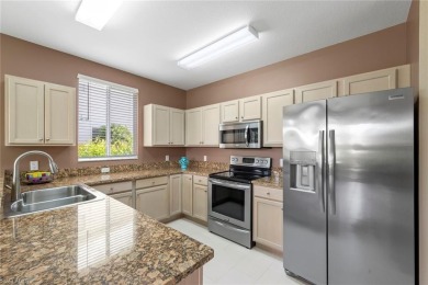 Experience resort-style living in this stunning 2-bedroom on Estero Country Club in Florida - for sale on GolfHomes.com, golf home, golf lot