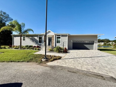 This charming home in Water Oak Country Club Estates, an active on Water Oak Country Club Estates in Florida - for sale on GolfHomes.com, golf home, golf lot