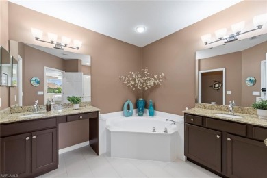 Experience resort-style living in this stunning 2-bedroom on Estero Country Club in Florida - for sale on GolfHomes.com, golf home, golf lot