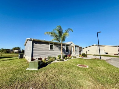 This charming home in Water Oak Country Club Estates, an active on Water Oak Country Club Estates in Florida - for sale on GolfHomes.com, golf home, golf lot