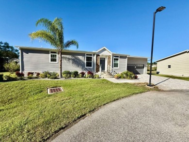 This charming home in Water Oak Country Club Estates, an active on Water Oak Country Club Estates in Florida - for sale on GolfHomes.com, golf home, golf lot