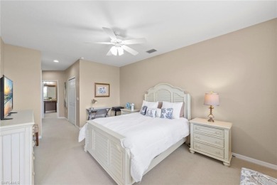 Experience resort-style living in this stunning 2-bedroom on Estero Country Club in Florida - for sale on GolfHomes.com, golf home, golf lot