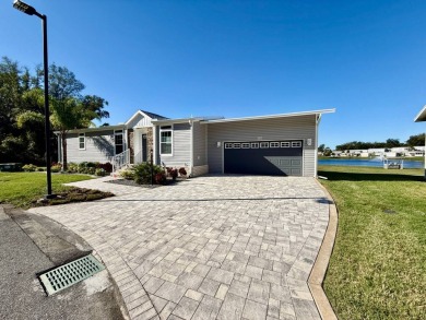 This charming home in Water Oak Country Club Estates, an active on Water Oak Country Club Estates in Florida - for sale on GolfHomes.com, golf home, golf lot