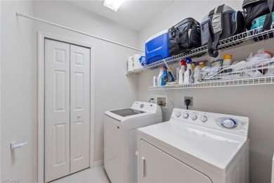 Experience resort-style living in this stunning 2-bedroom on Estero Country Club in Florida - for sale on GolfHomes.com, golf home, golf lot