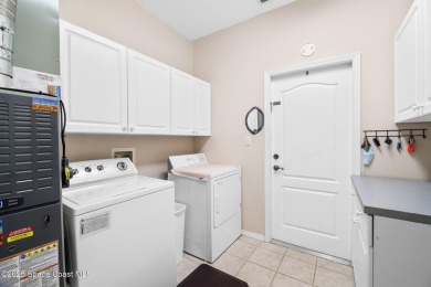 Located in the highly sought-after Parkstone subdivision, this on Viera East Golf Club in Florida - for sale on GolfHomes.com, golf home, golf lot