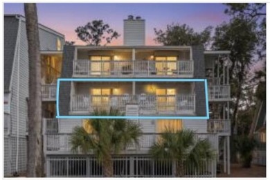 A stunning 2 bedroom, 2 bath condo on the 18th tee and fairway on The Plantation Course At Edisto in South Carolina - for sale on GolfHomes.com, golf home, golf lot