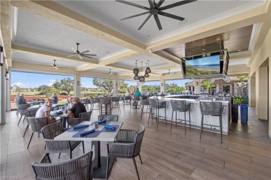 Experience resort-style living in this stunning 2-bedroom on Estero Country Club in Florida - for sale on GolfHomes.com, golf home, golf lot